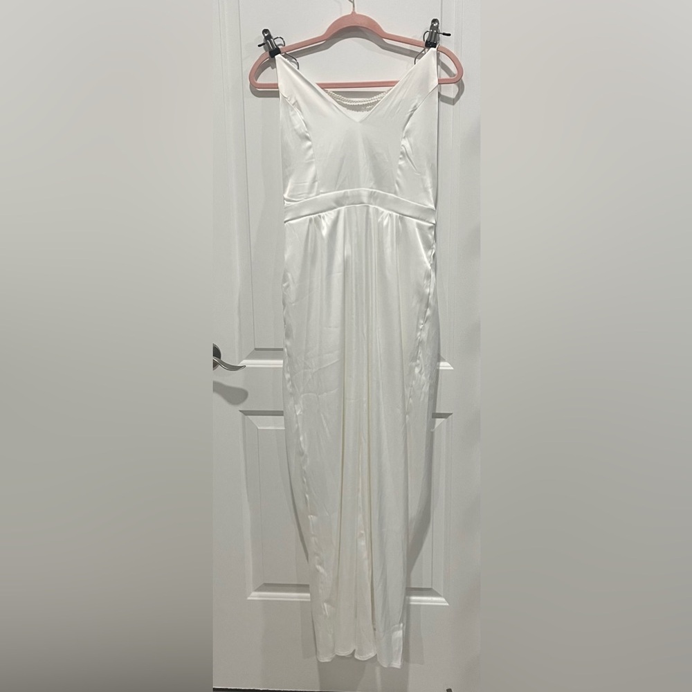 Elegant White Satin Jumpsuit with pearl embellishing on the back